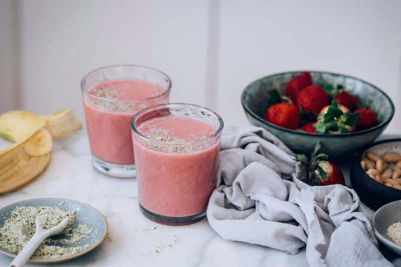Strawberry and banana smoothies served in glasses